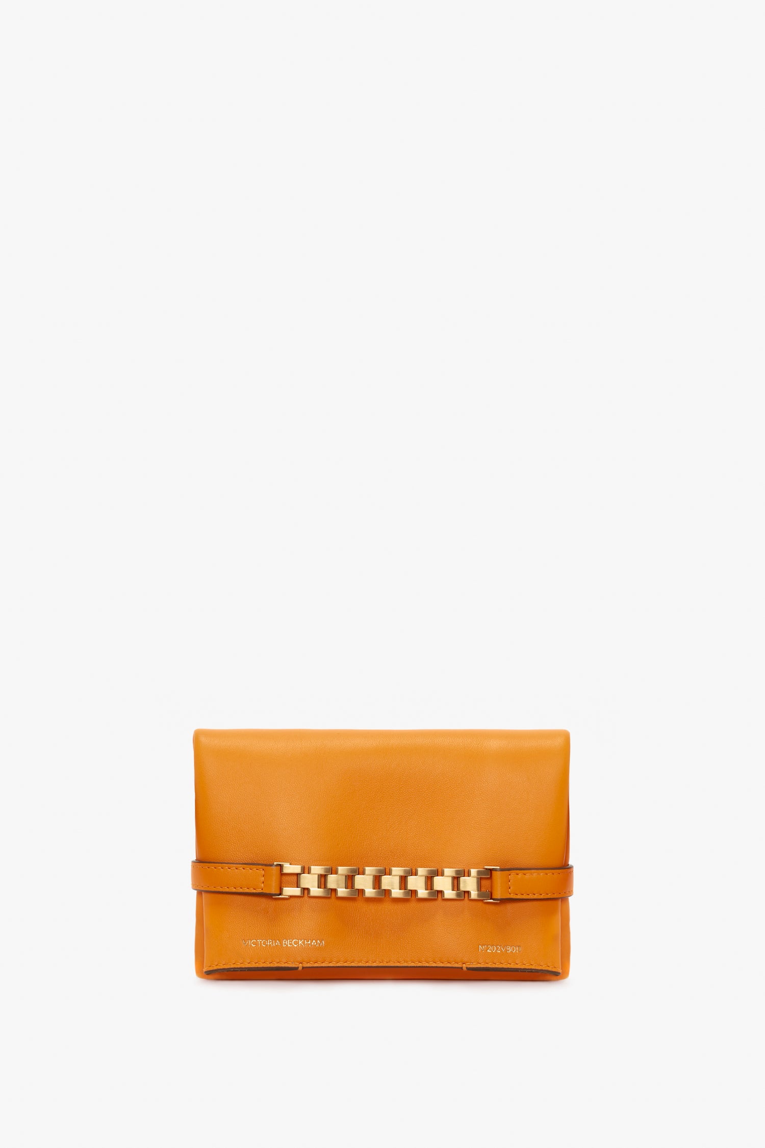 A rectangular bright mandarin leather clutch bag with a gold chain detail across the front and small text embossed at the bottom, Victoria Beckham UK Mini Chain Pouch Bag With Long Strap In Mandarin Leather.