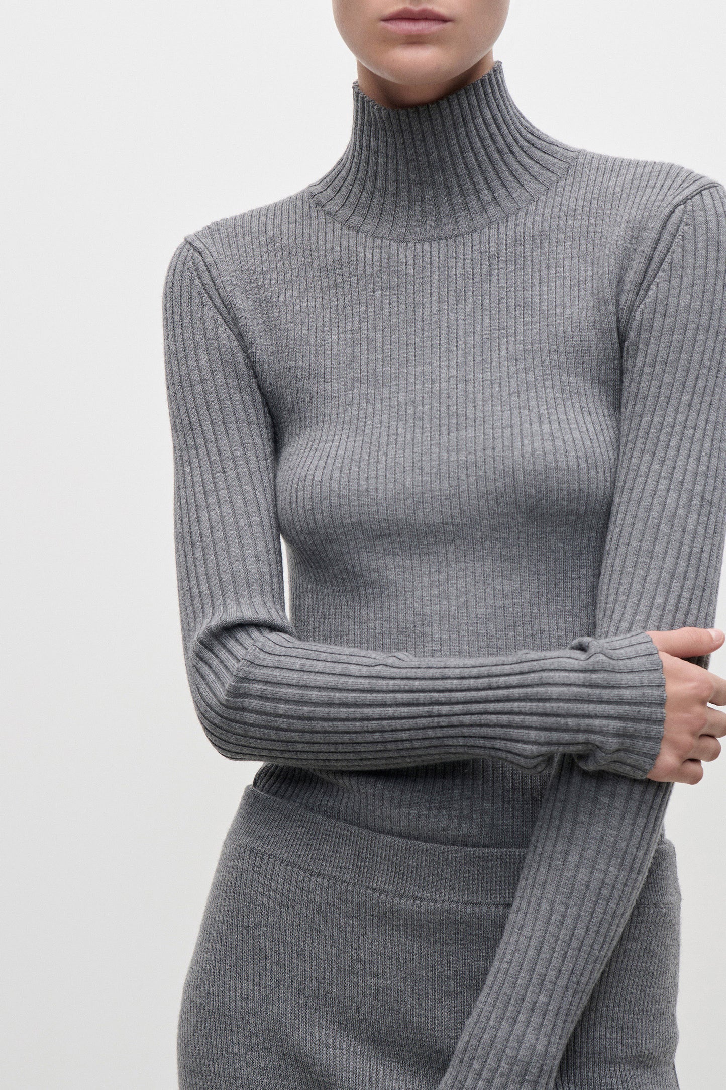 High Neck Jumper In Grey Melange
