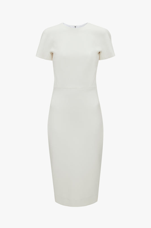 A Fitted T-shirt Dress In Ivory from Victoria Beckham with a high neckline and plain design offers a fitted silhouette. Pair it perfectly with Pointy Toe Stiletto Sandals for an elegant look.