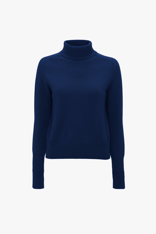 A Polo Neck Jumper In Navy by Victoria Beckham, with a regular fit and textured knit, displayed on a plain white background.