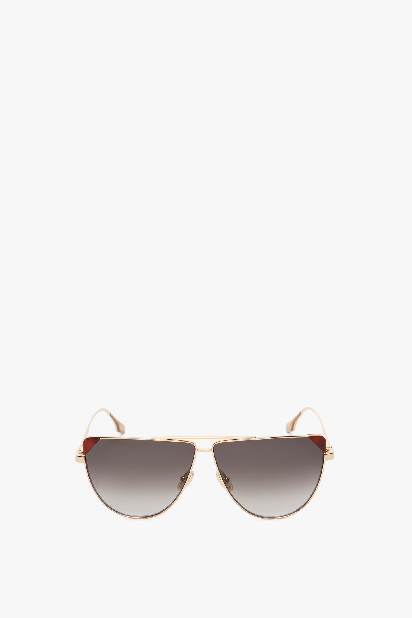 Victoria Beckham V-Line Aviator In Gold Blonde Havana sunglasses with gradient black lenses, shown on a white background.