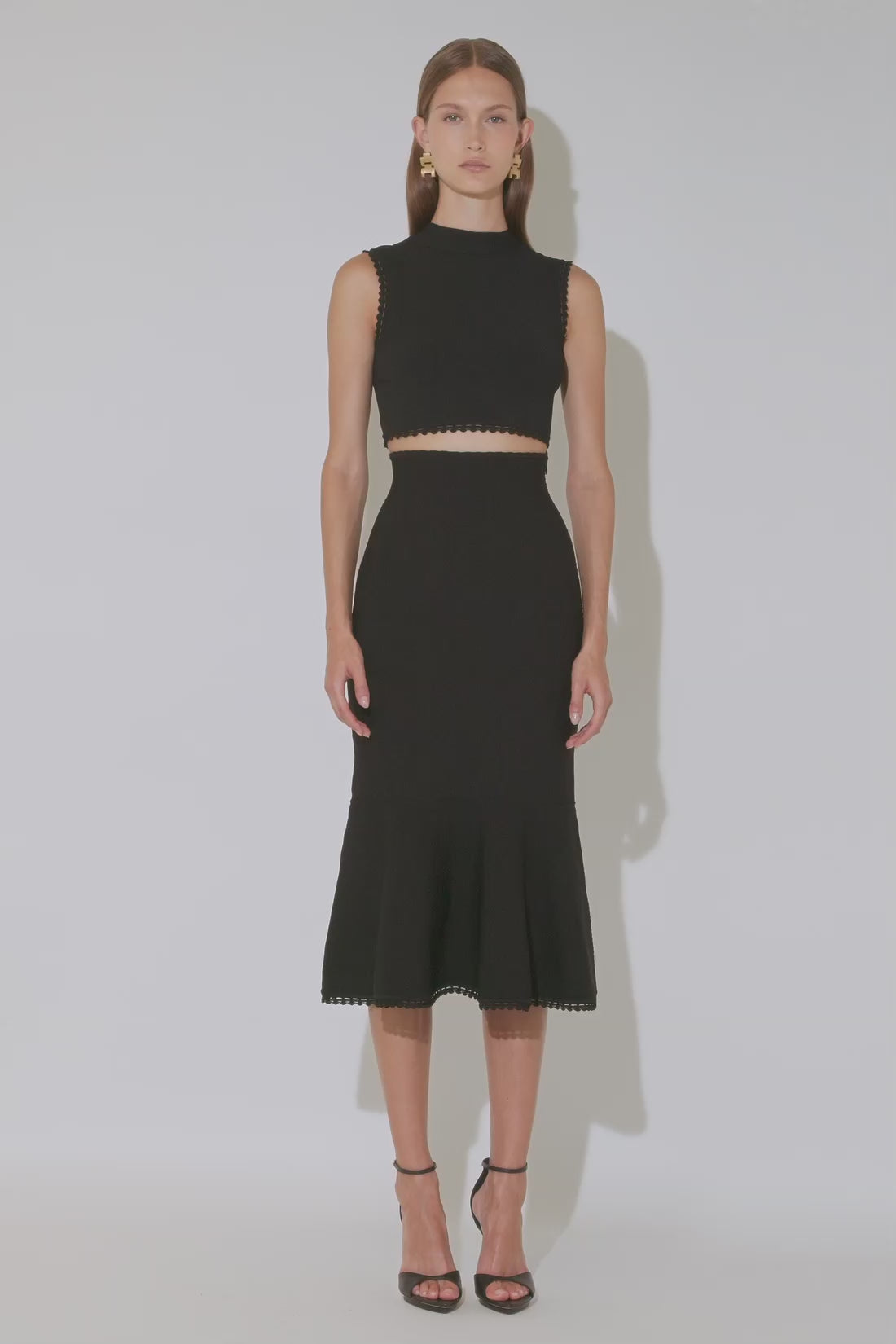 Flared skirt black top