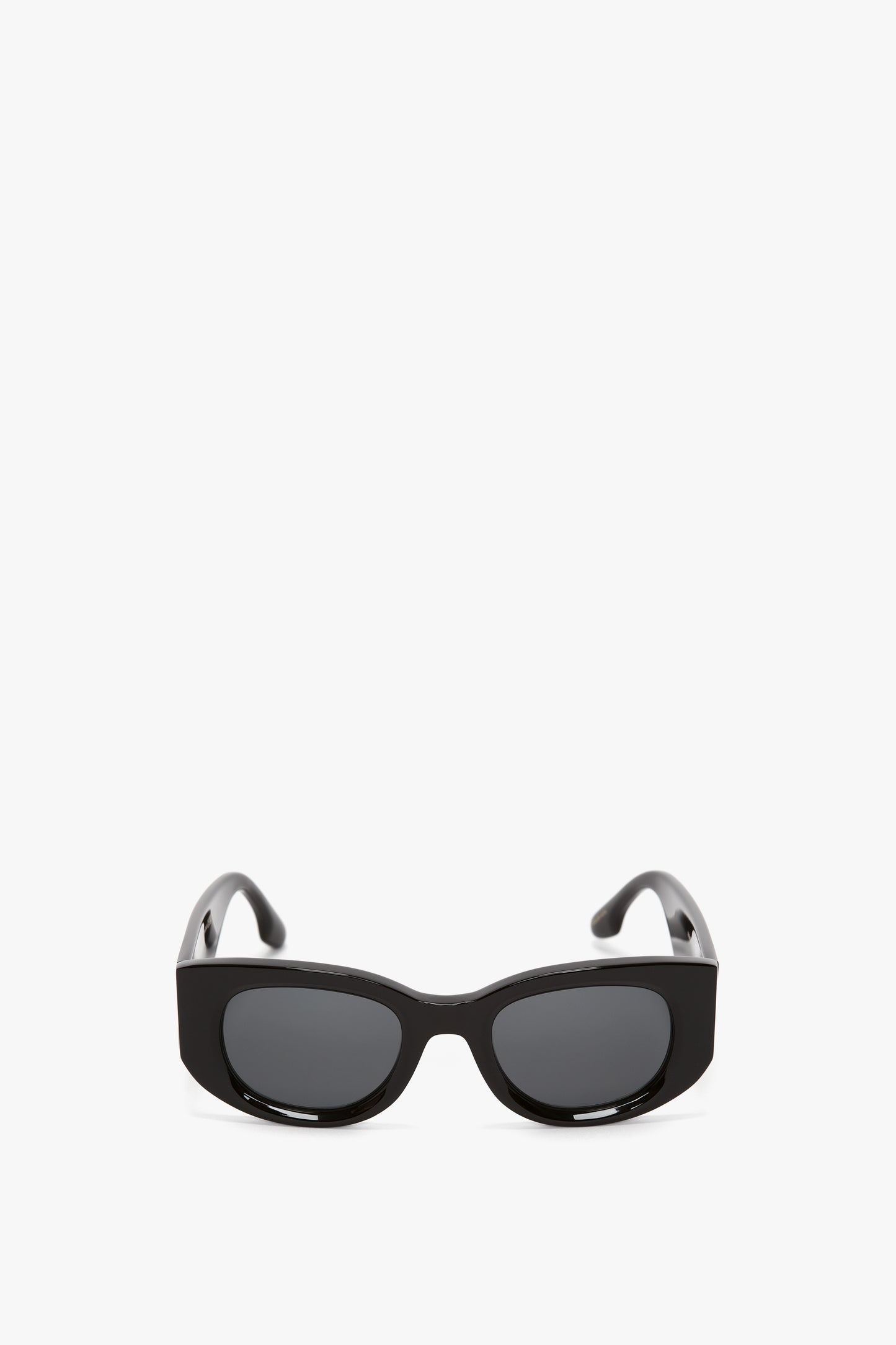 A pair of black rectangular Victoria Beckham Monogram Detail Sunglasses In Black with dark lenses, shown against a white background.
