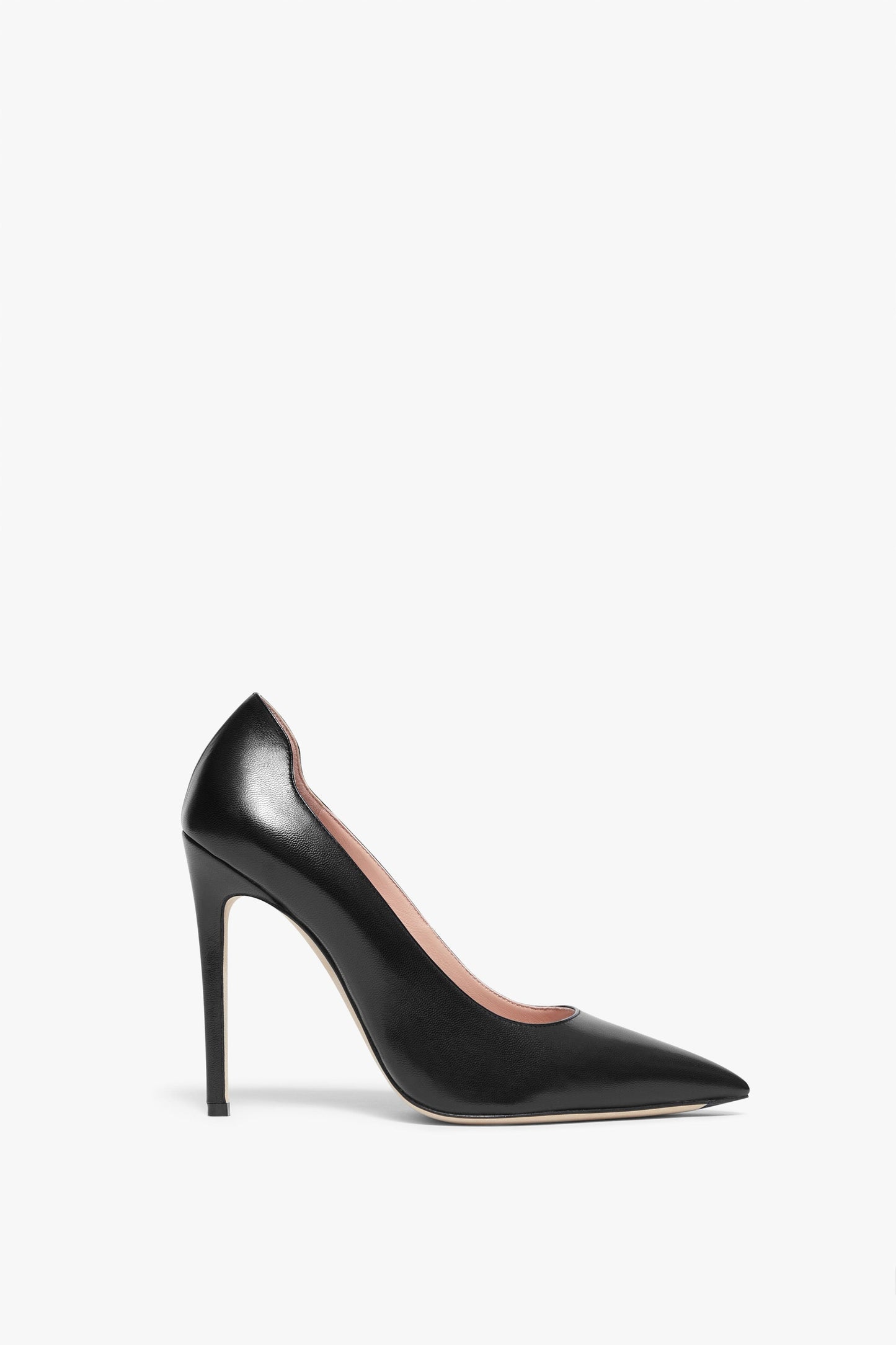 Side view of a single black VB Pump 115mm in Black by Victoria Beckham featuring a pointed toe, stiletto heel, and smooth leather finish.