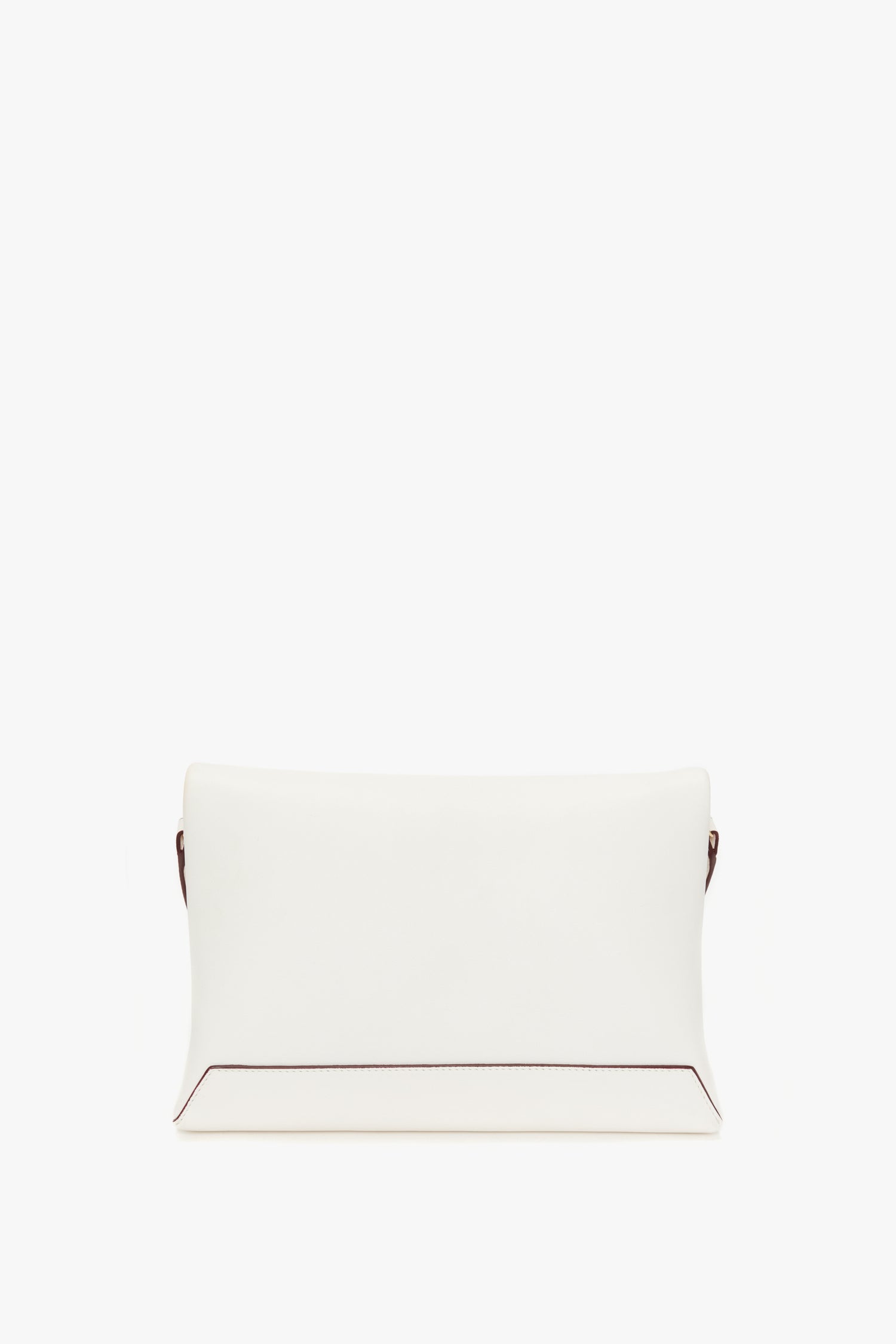 White rectangular chain pouch with strap in white leather by Victoria Beckham, featuring a minimalist design and visible brown stitching at the sides, against a plain white background.