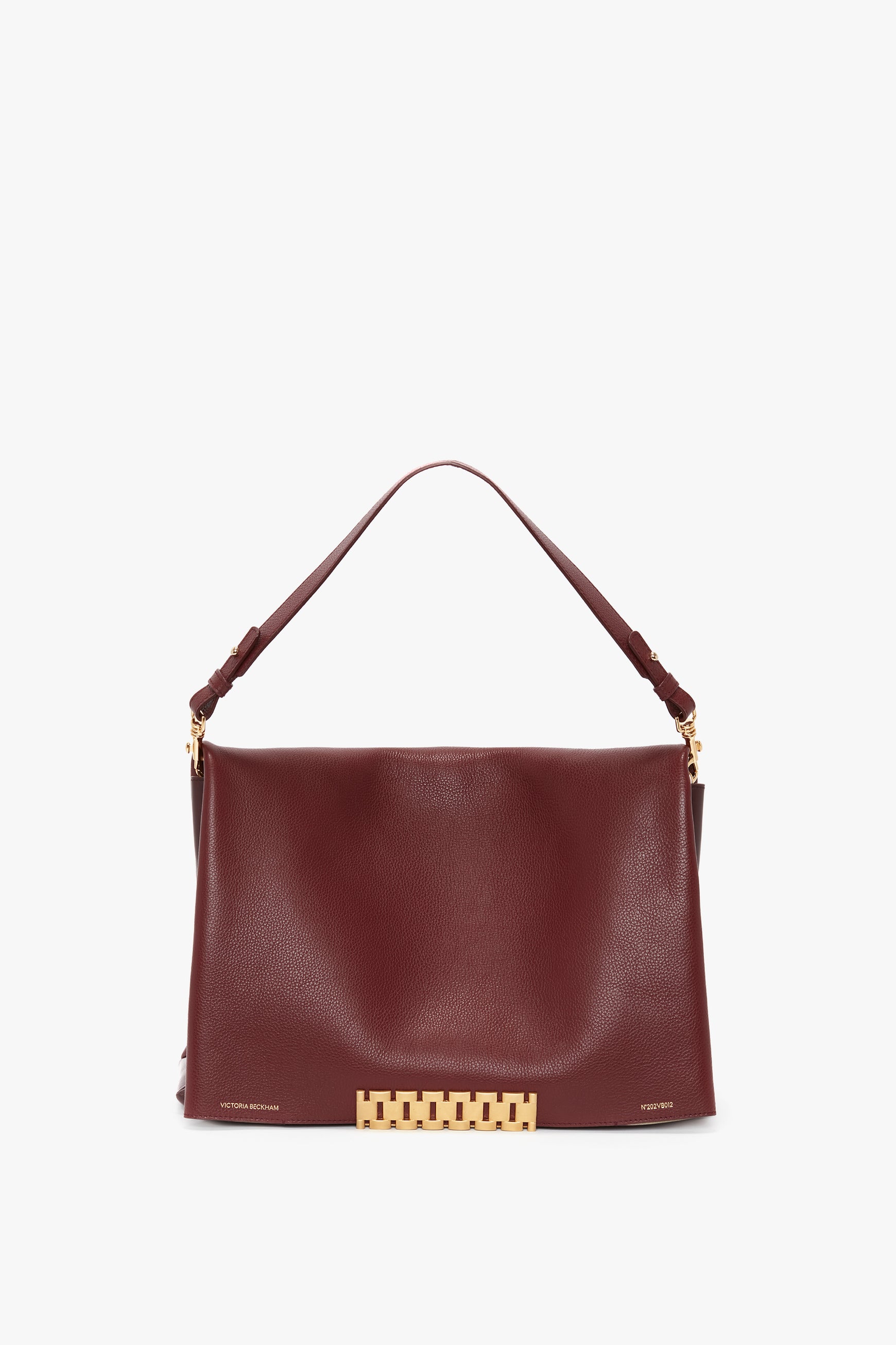 A Victoria Beckham Jumbo Chain Pouch Bag in Bordeaux Leather with gold hardware, featuring a shoulder strap and a rectangular clasp design at the front base.