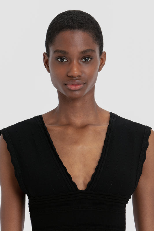 Stretch Knit Sleeveless Flared Dress In Black