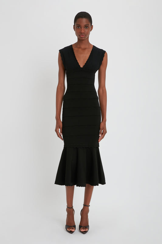 Stretch Knit Sleeveless Flared Dress In Black