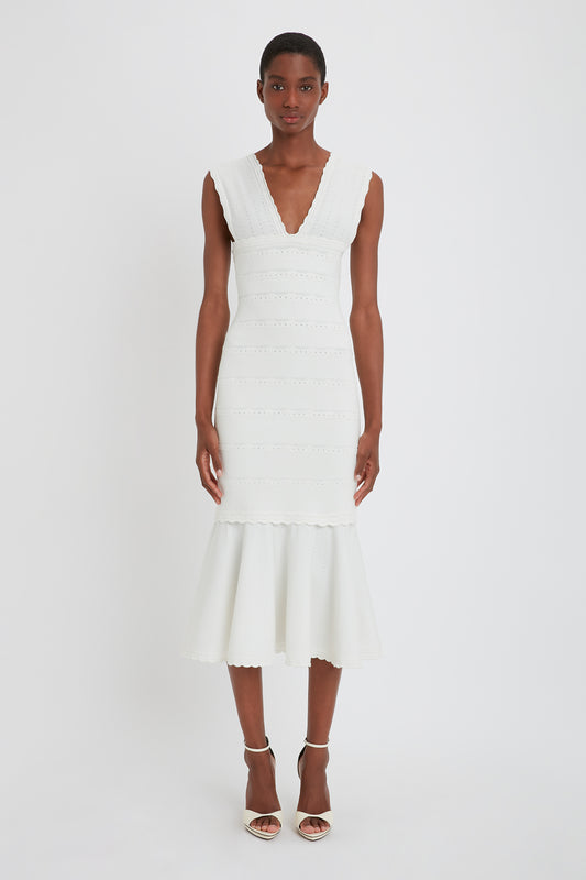 Stretch Knit Sleeveless Flared Dress In White